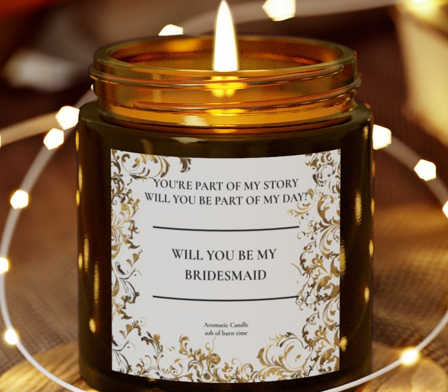 Candle in a jar with a 'Will You Be My Bridesmaid?' label on a blurred background with lights.