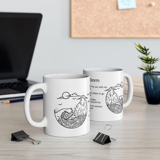 Two mugs with wave designs on a desk with a laptop and plant in the background